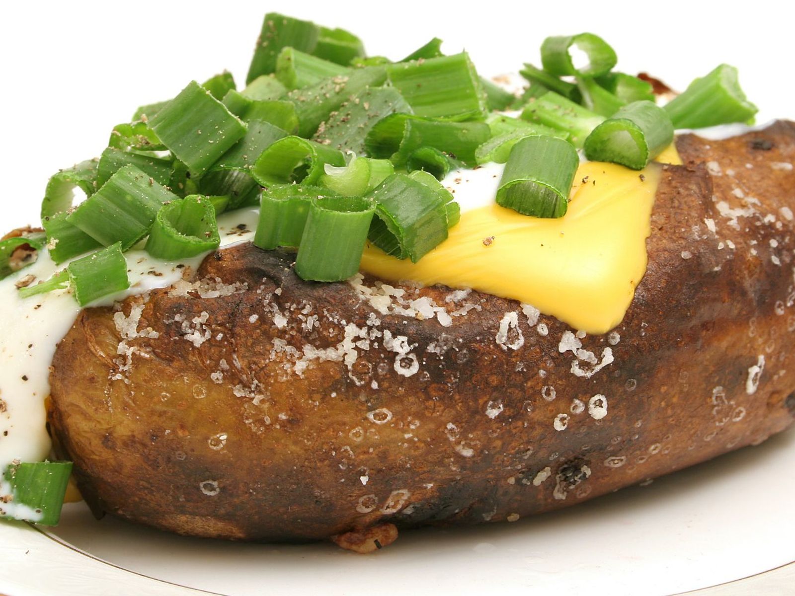 Order Baked Potato food online from Sizzler store, Nampa on bringmethat.com