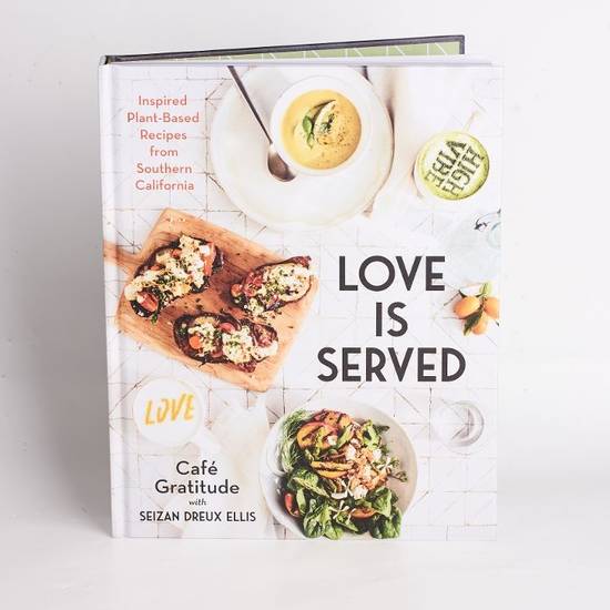 Order LOVE IS SERVED COOKBOOK food online from Cafe Gratitude store, San Diego on bringmethat.com