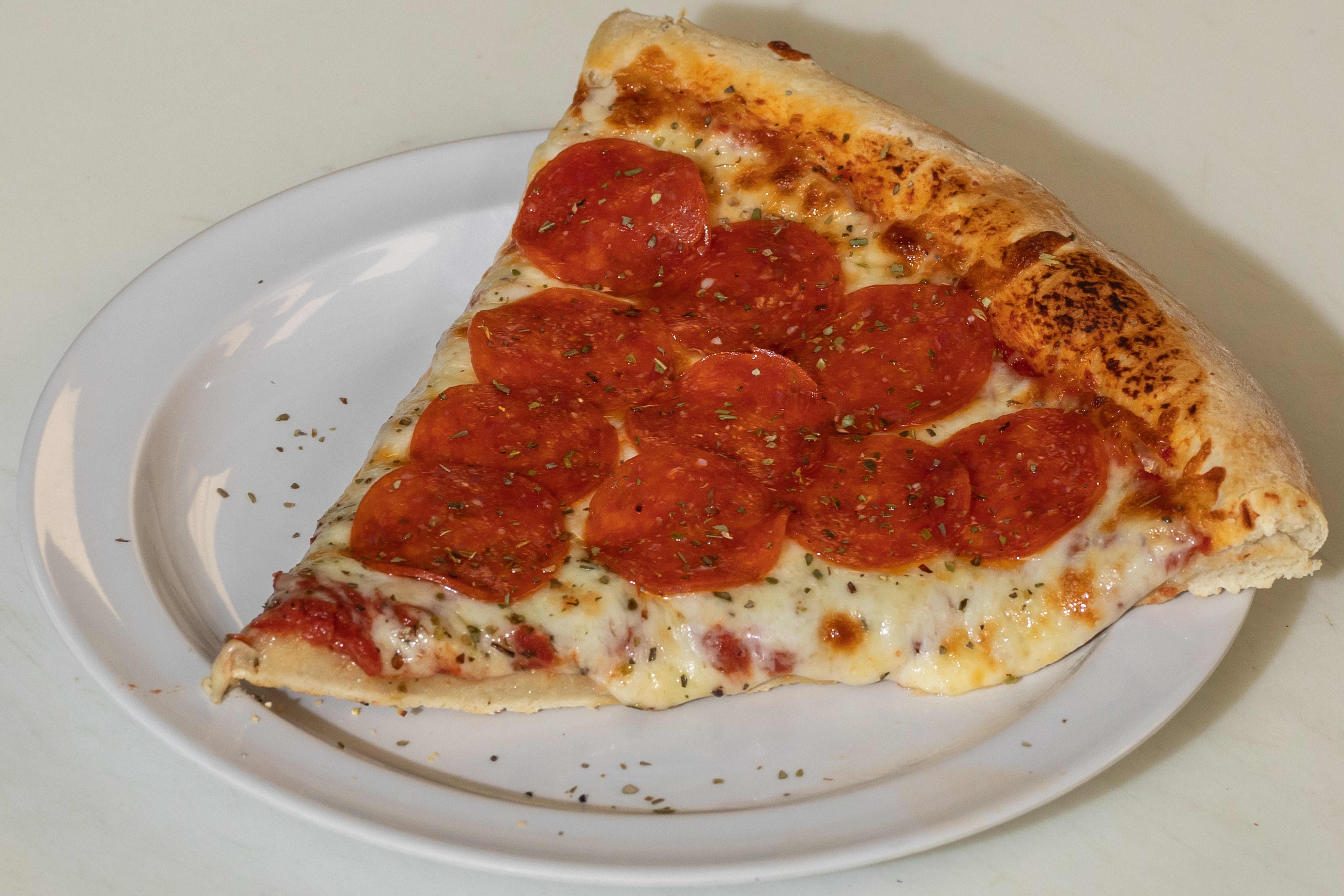 Order Pepperoni Pizza Slice food online from Tortorice's Pizza & Catering store, Chicago on bringmethat.com