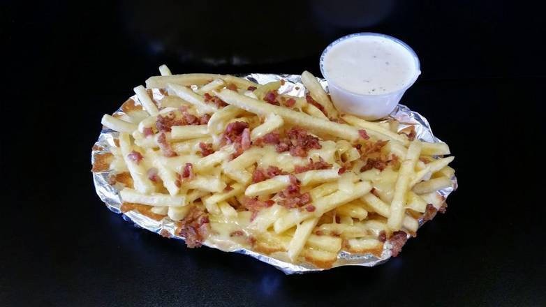 Order Loaded Fries food online from St. Louis Pizza and Wings store, St. Louis on bringmethat.com