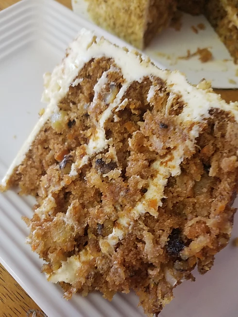 Order Slice of Carrot Cake food online from Who Doesnt Like Cake? store, Birmingham on bringmethat.com