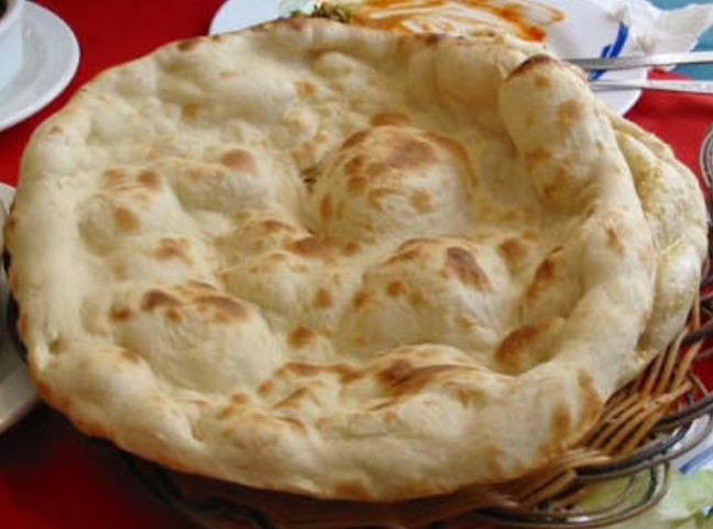 Order Pishaureri Naan food online from Indian Kitchen Lovash store, Philadelphia on bringmethat.com