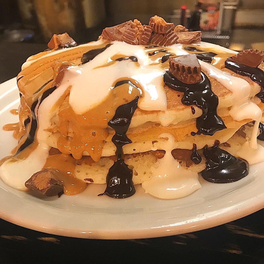 Order Reese’s Peanut Butter Cup Pancakes food online from Rise N' Shine store, Syracuse on bringmethat.com