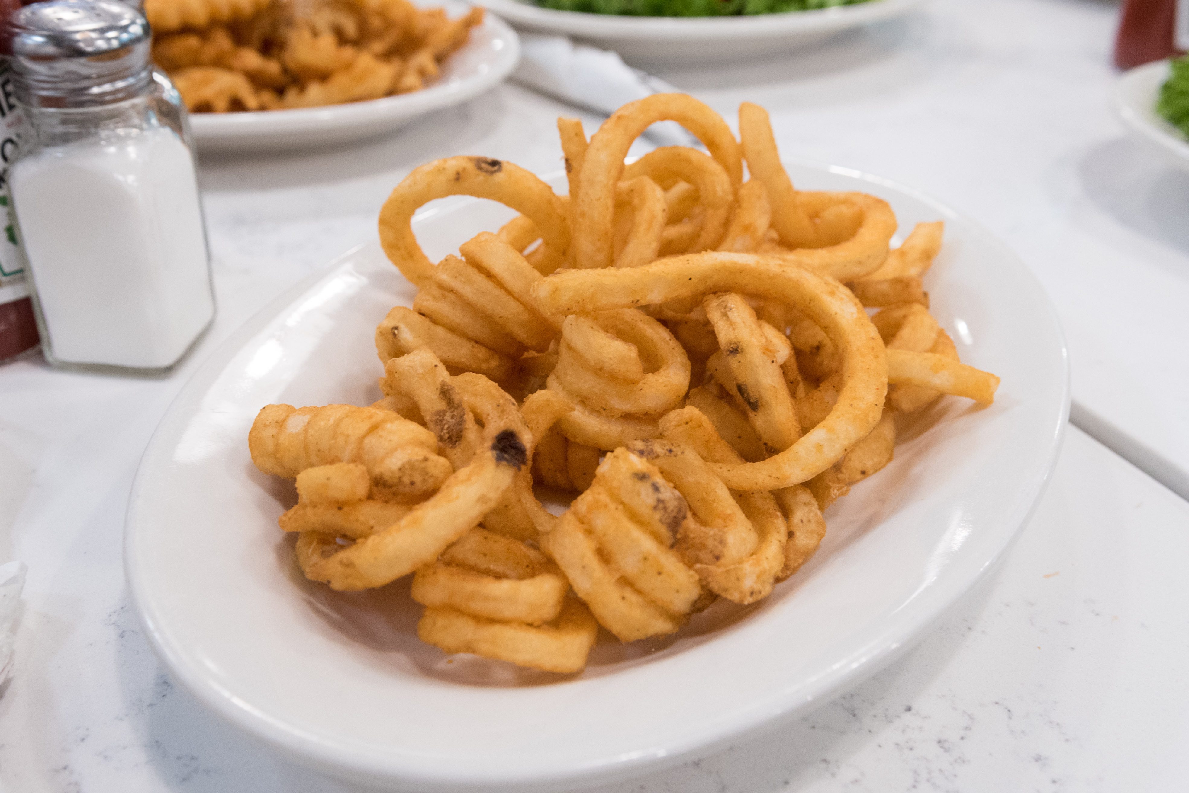 Order Curly Fries food online from Tasty's restaurant store, Ridgewood on bringmethat.com