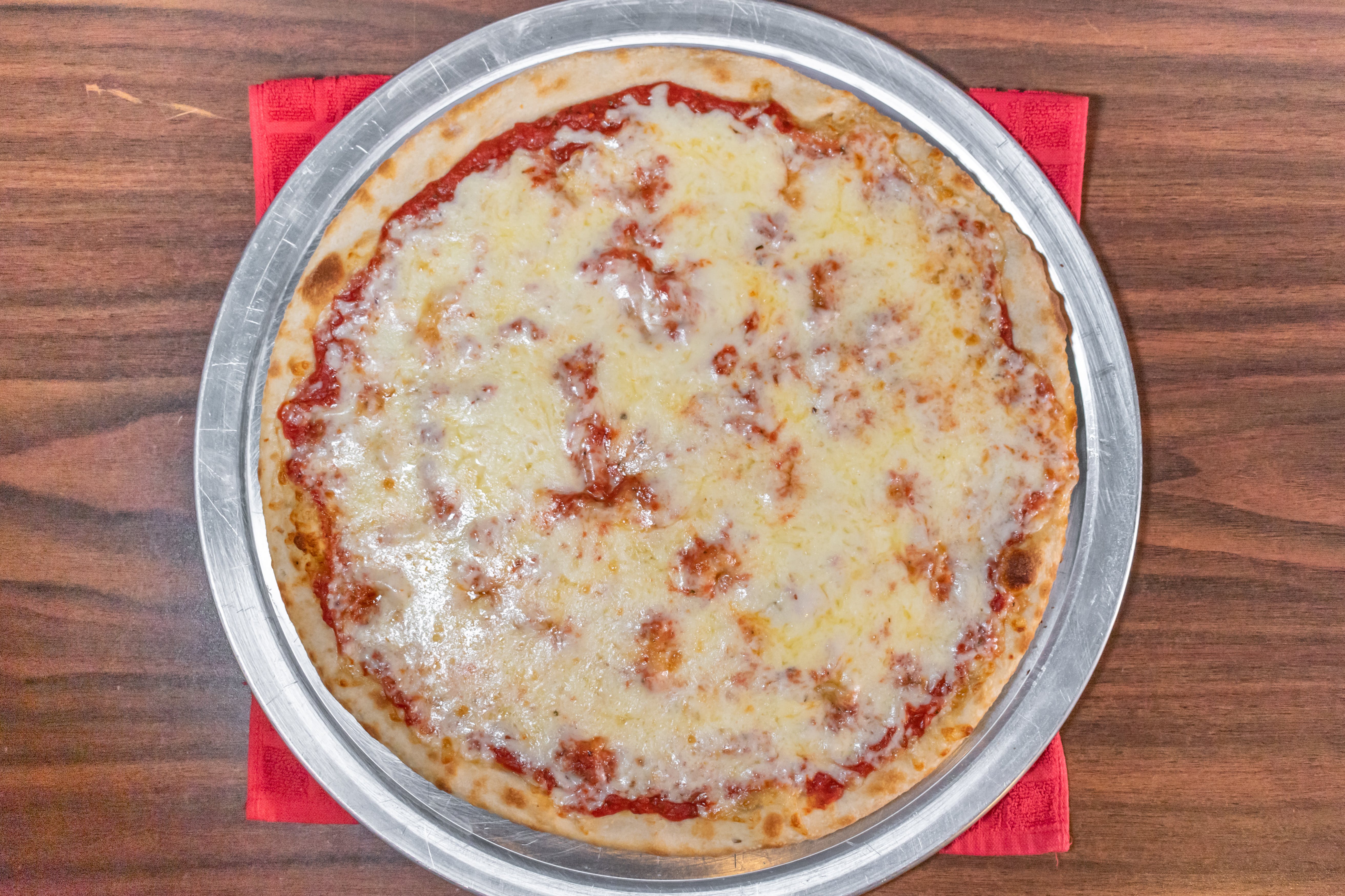 Order Cheese Pizza - 12'' food online from Gotham Pizza store, Houston on bringmethat.com