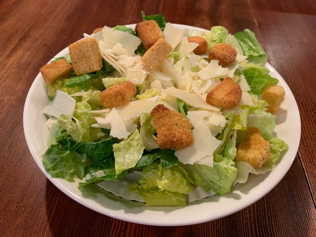 Order Caesar Salad - Salad food online from Cybelles Pizza store, Oakland on bringmethat.com