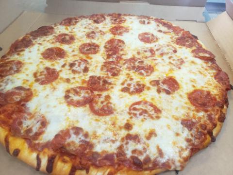 Order 12'' Medium Pizza food online from Pizza Man of Columbia Heights store, Minneapolis on bringmethat.com
