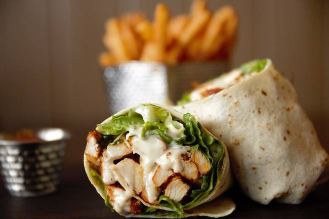 Order Grilled Chicken Caesar Wrap - food online from Southern Chicken store, Morganville on bringmethat.com