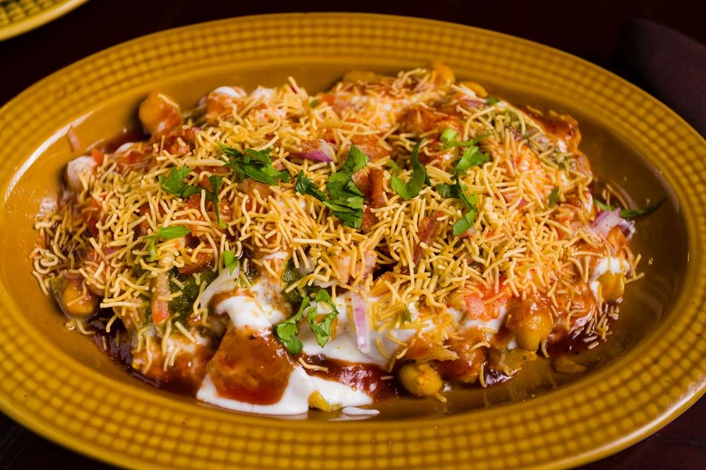 Order Samosa Chaat food online from Dhaba indian cuisine store, New York on bringmethat.com