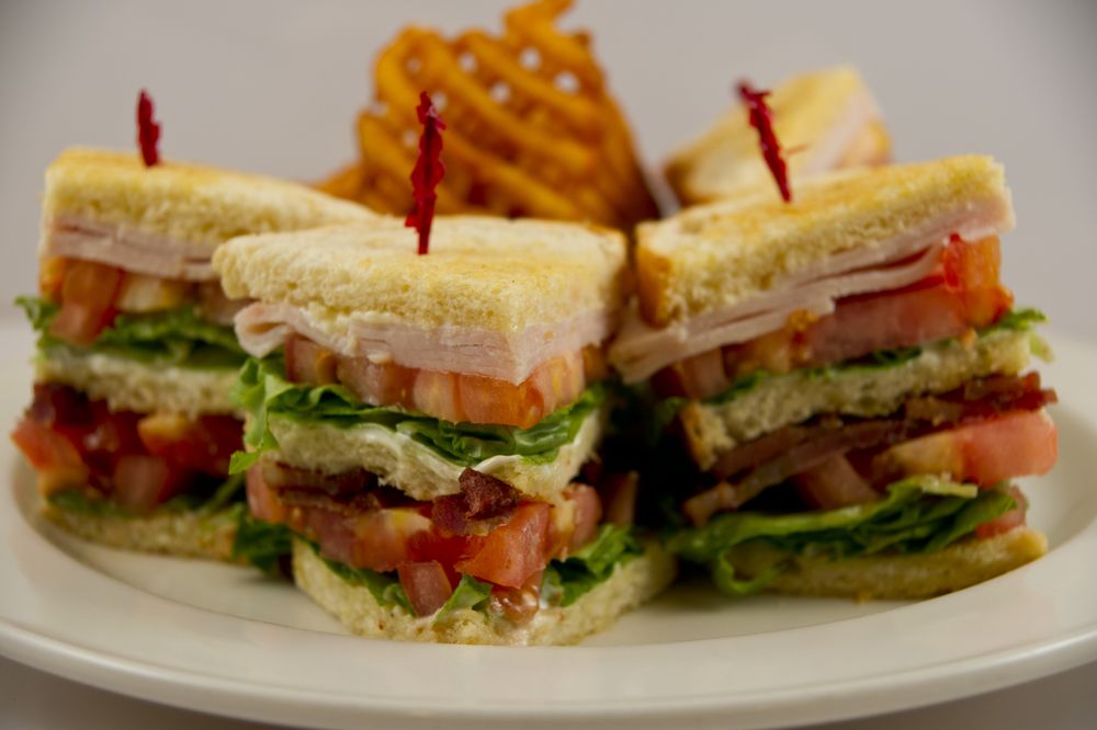 Order Clubhouse Deluxe Sandwich food online from Georges Place store, Kirkland on bringmethat.com