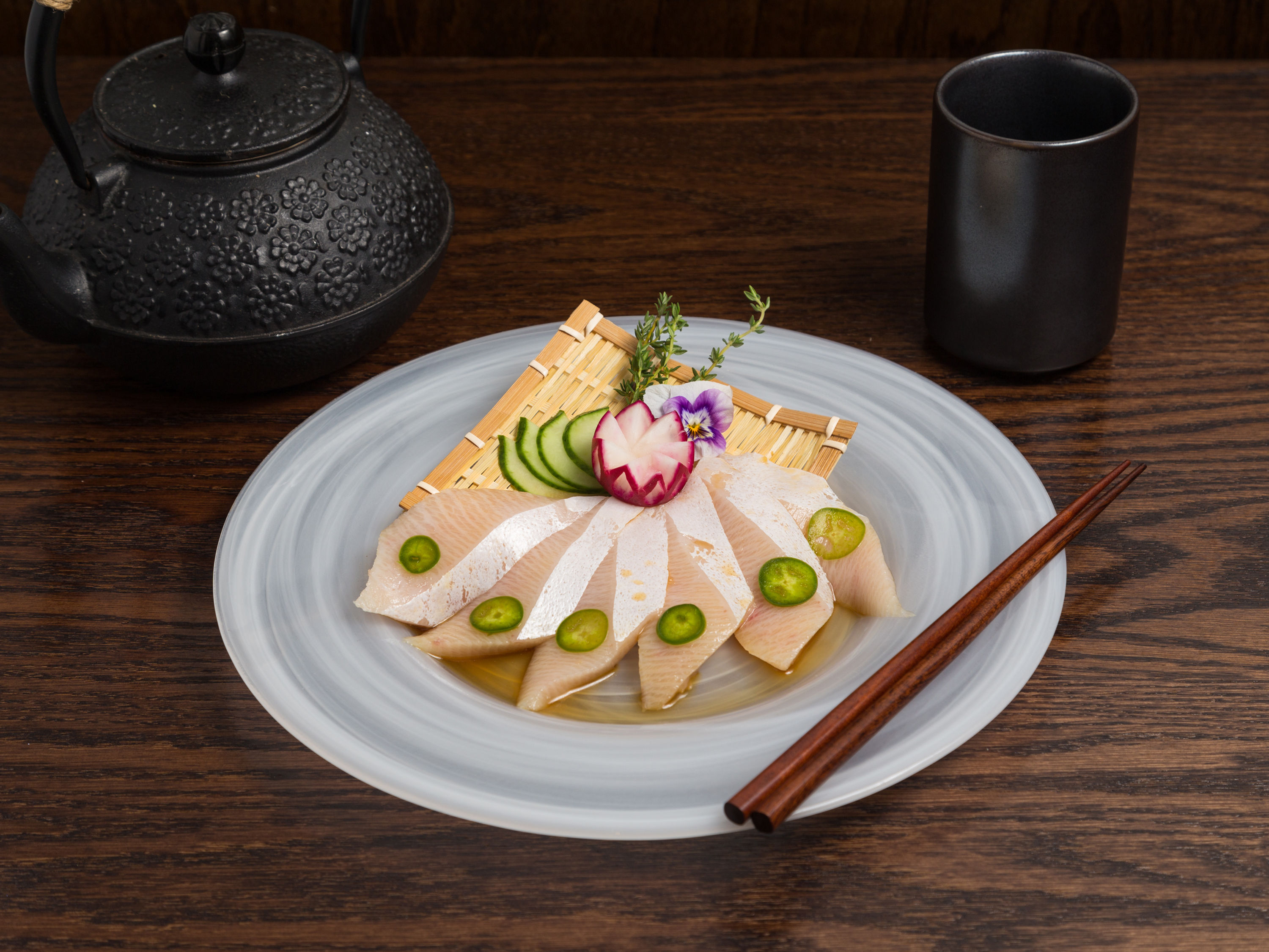Order Yellowtail Sashimi with Jalapeno food online from Hakata Ramen & Sushi Bar store, Waltham on bringmethat.com