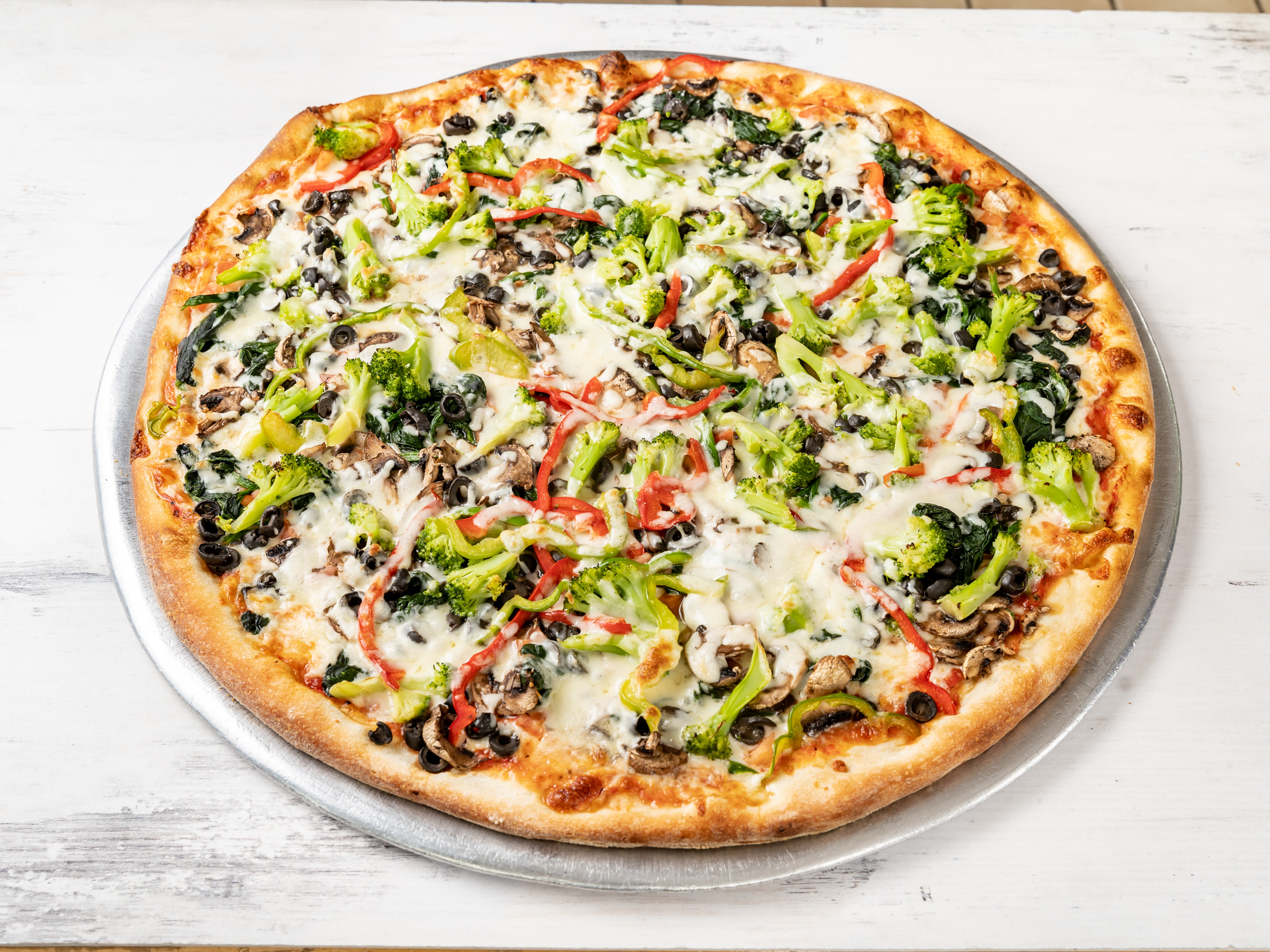 Order Vegetable Pizza (one size 18") food online from East Village Pizza & Kebabs store, New York on bringmethat.com