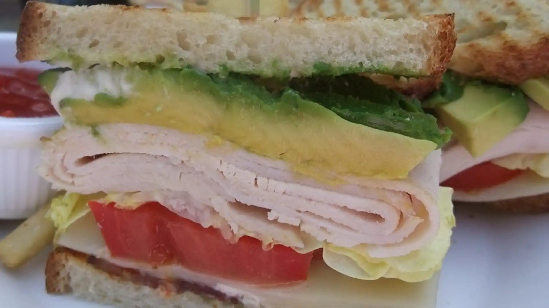 Order Turkey Club Sandwich food online from Mill Basin Bagel Cafe store, Kings on bringmethat.com