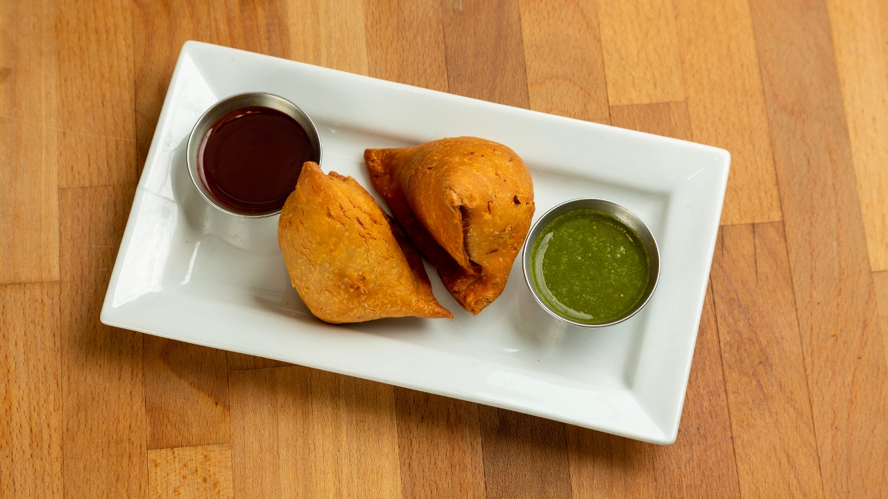 Order Samosa food online from Dhaba indian cuisine store, New York on bringmethat.com