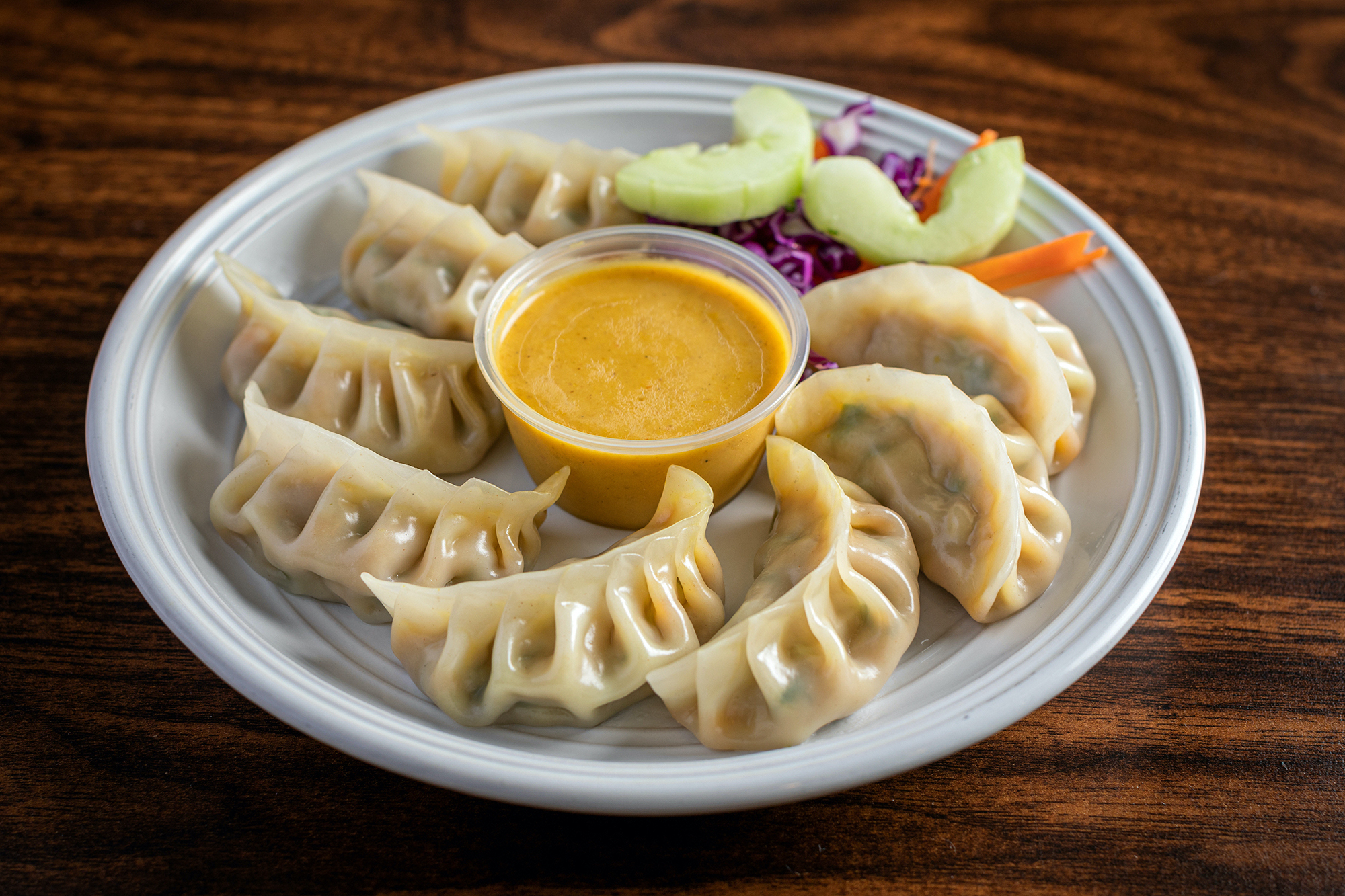 Order Veg Butter Toasted Momo food online from MOMO Factory store, Chicago on bringmethat.com