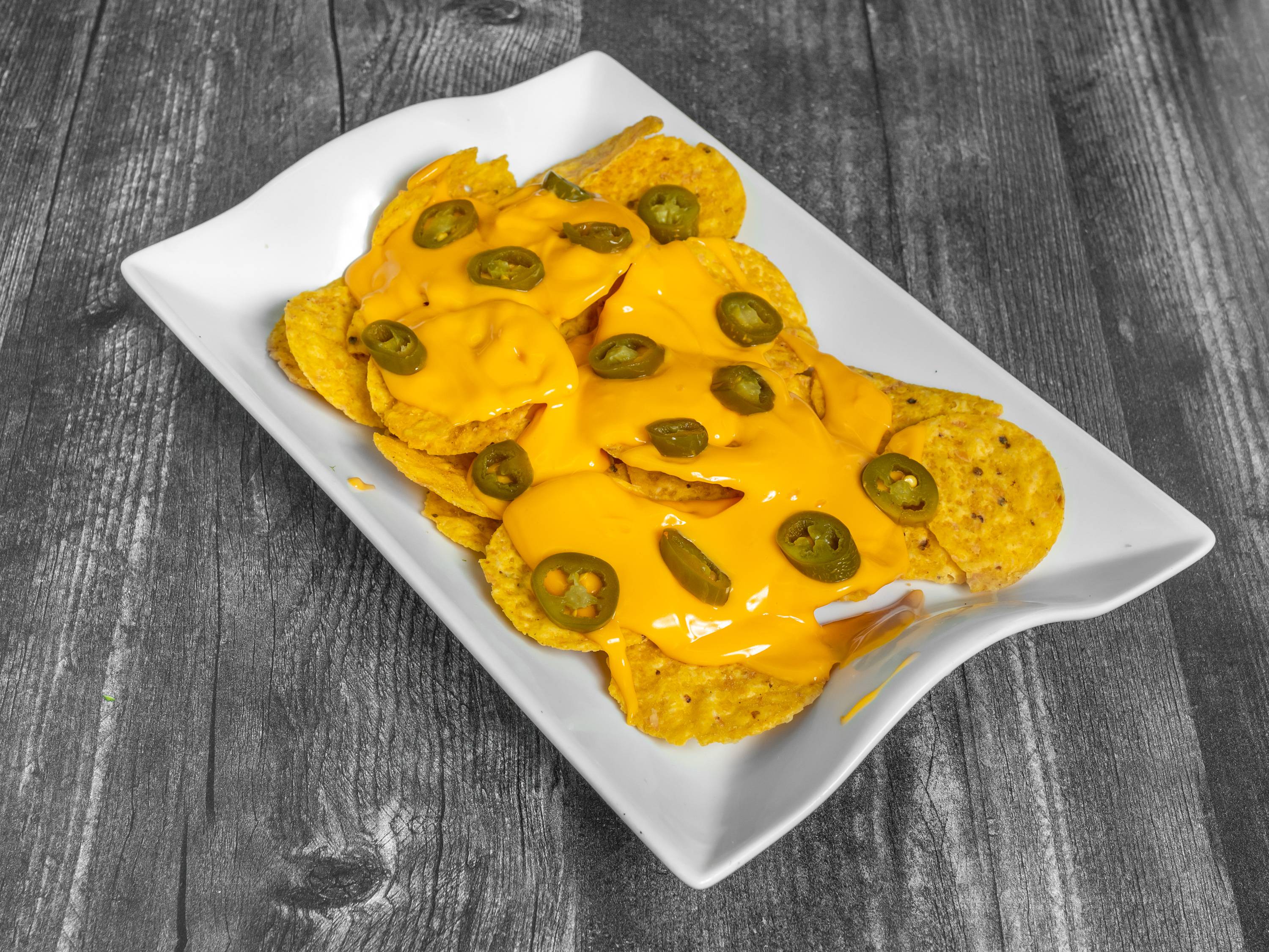Order Nachos, Cheese and Jalapenos food online from Marvins Tacos store, Belvidere on bringmethat.com