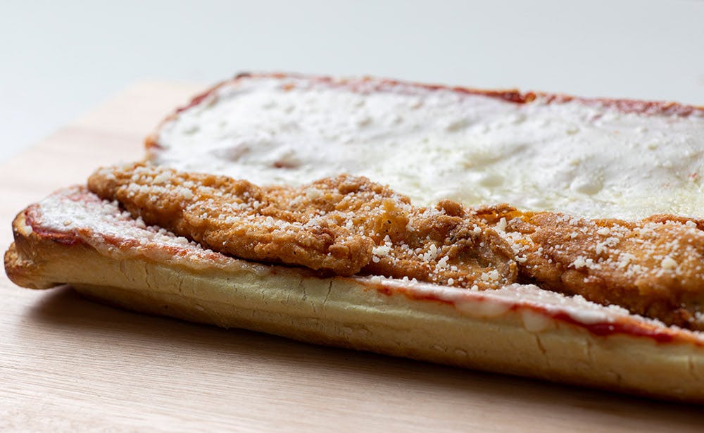 Order Chicken Parm Sub - Half food online from Calz Pizza store, Norfolk on bringmethat.com