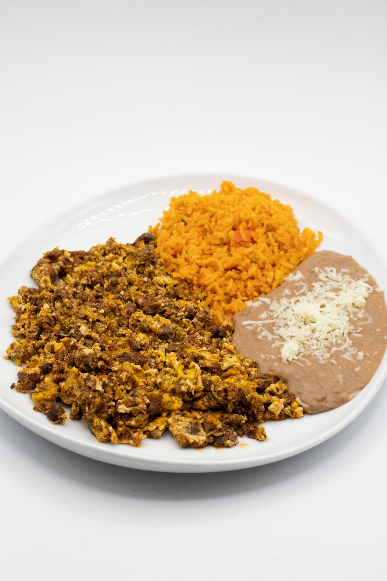 Order Huevos Con Chorizo (Eggs with Mexican Sausage) food online from Cilantro Taco Grill store, Rosemont on bringmethat.com