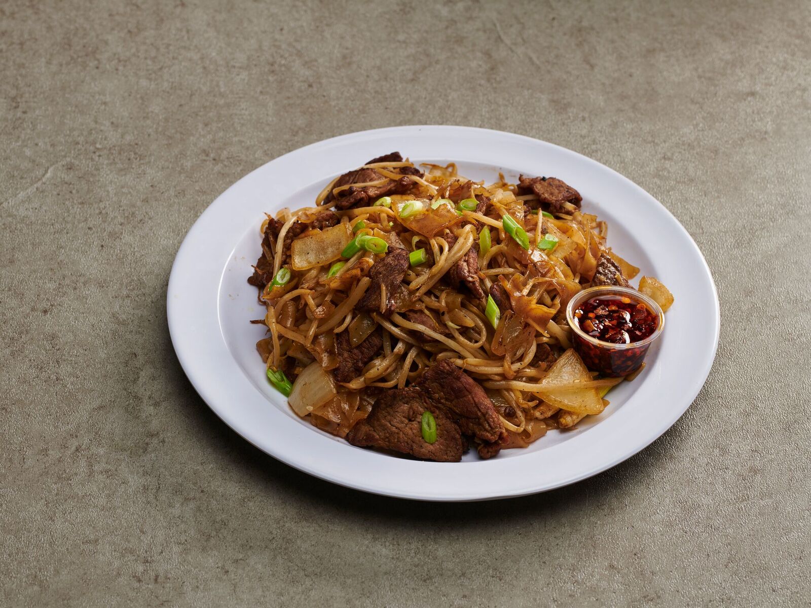 Order 23. Pan Fried Rice Noodles with Beef food online from Pho T store, Las Vegas on bringmethat.com