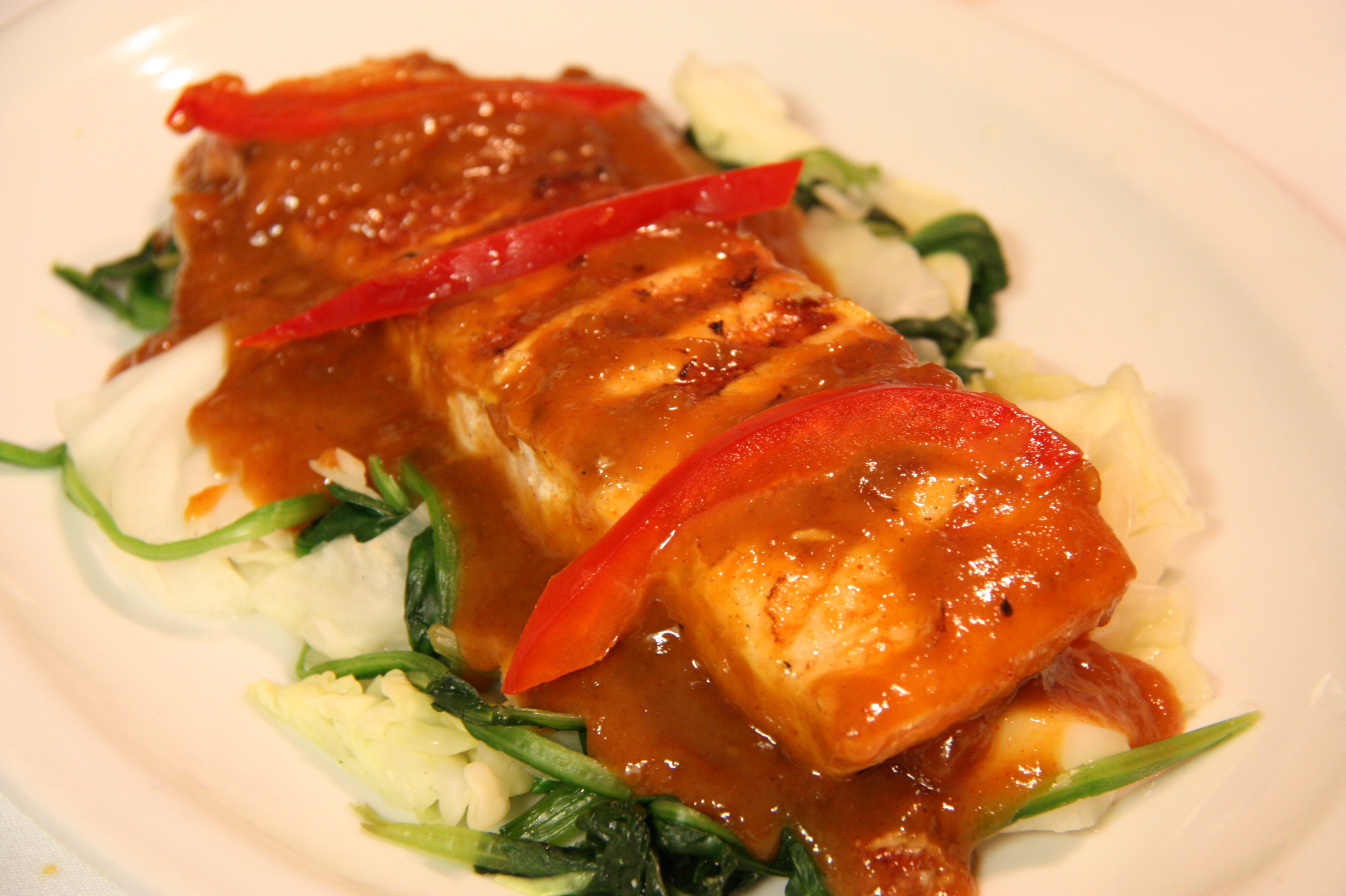 Order Charbroiled Salmon Fillet with Peanut Sauce food online from Ploy Ii-Thai Cuisine store, San Francisco on bringmethat.com