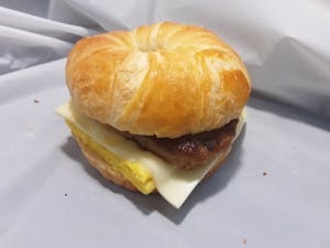 Order SAUSAGE EGG AND CHEESE ON CROISSANT food online from Millers Country Kitchen store, Middletown on bringmethat.com