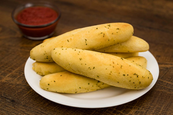 Order Garlic Breadsticks food online from Gionino Pizzeria store, Hudson on bringmethat.com