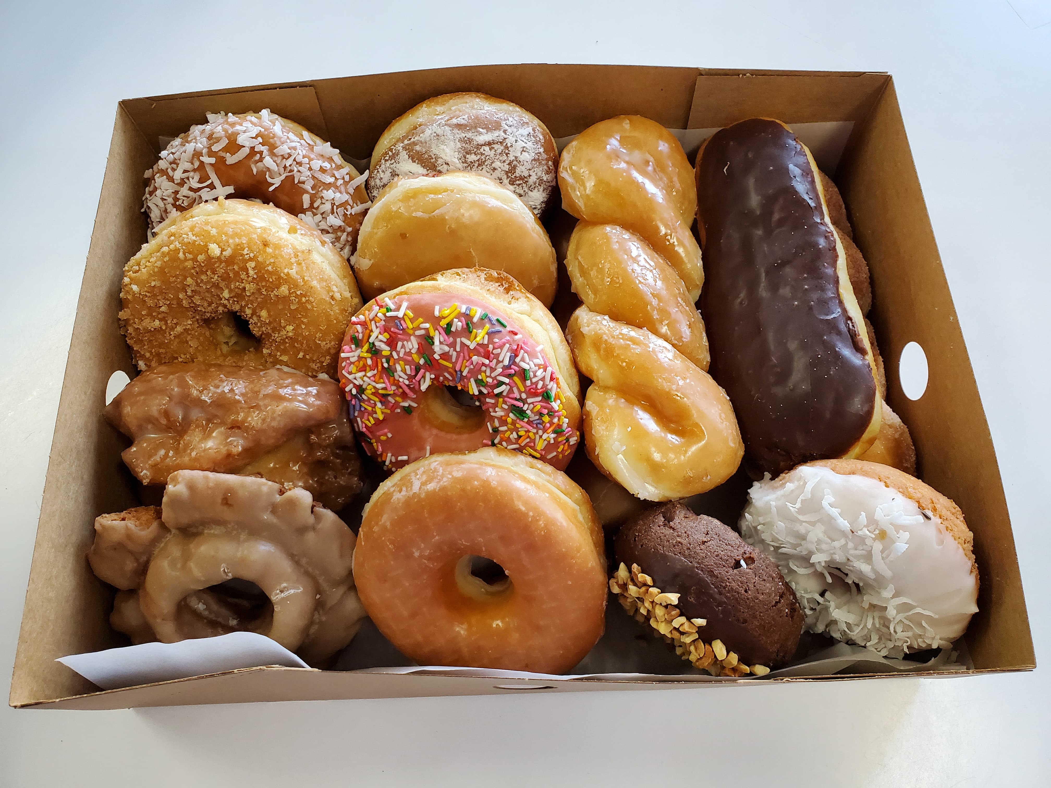 Order Dozen Mix food online from Honey Donuts store, Crowley on bringmethat.com
