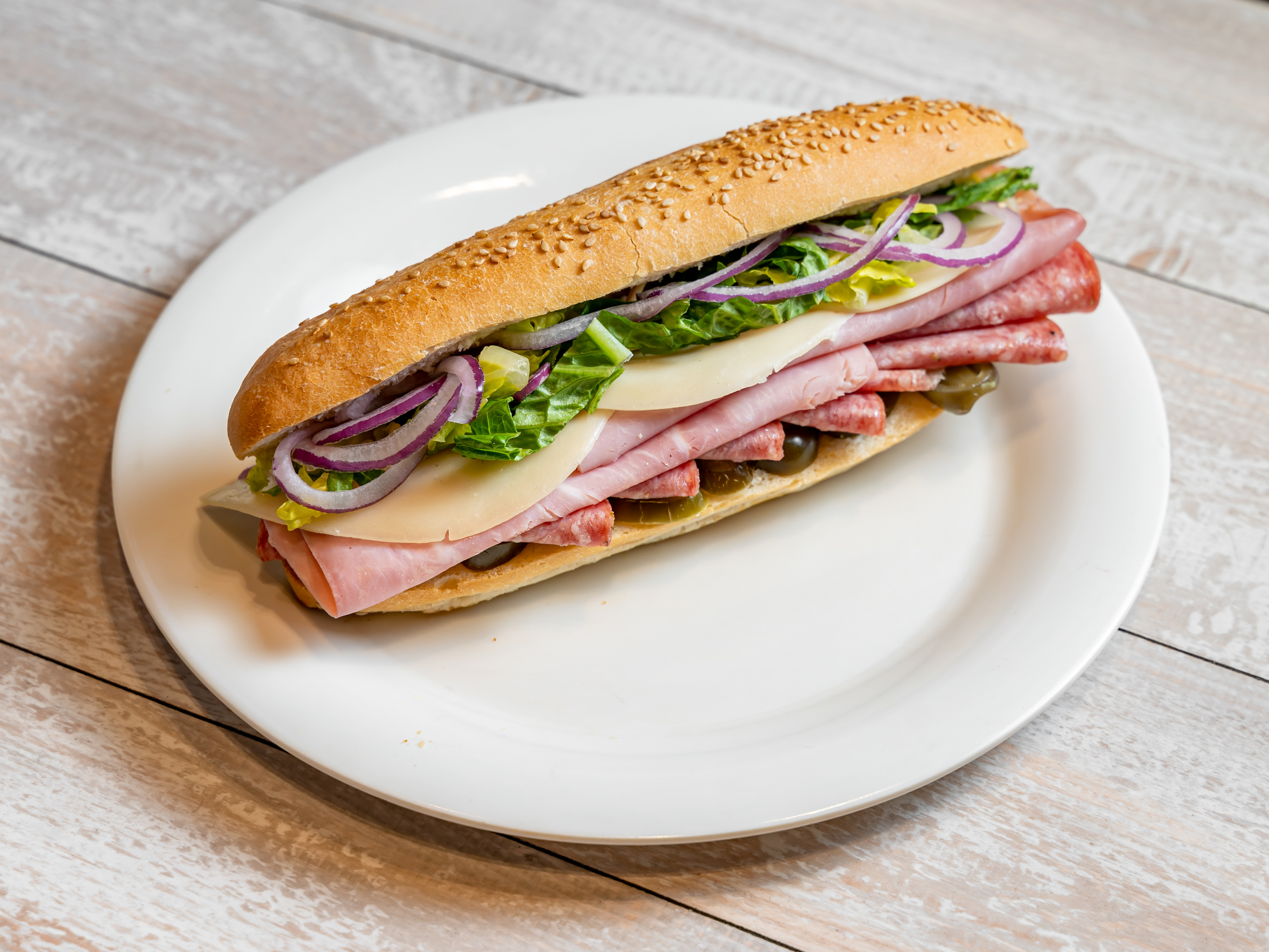 Order Italian Submarine food online from Cafe Metro store, New York on bringmethat.com