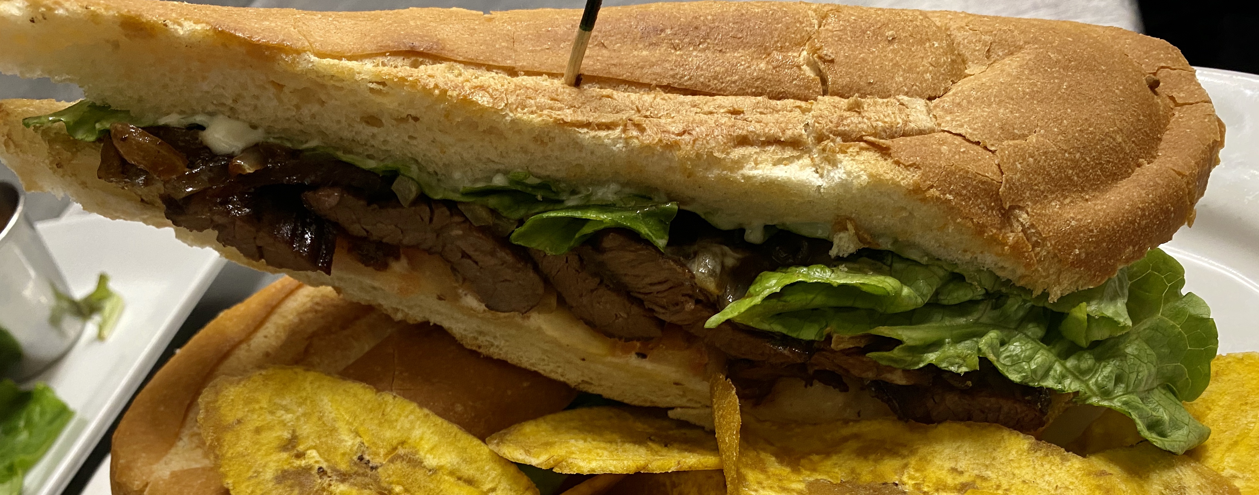 Order Pan con Bistec Sandwich food online from Guantanamera restaurant store, New York on bringmethat.com
