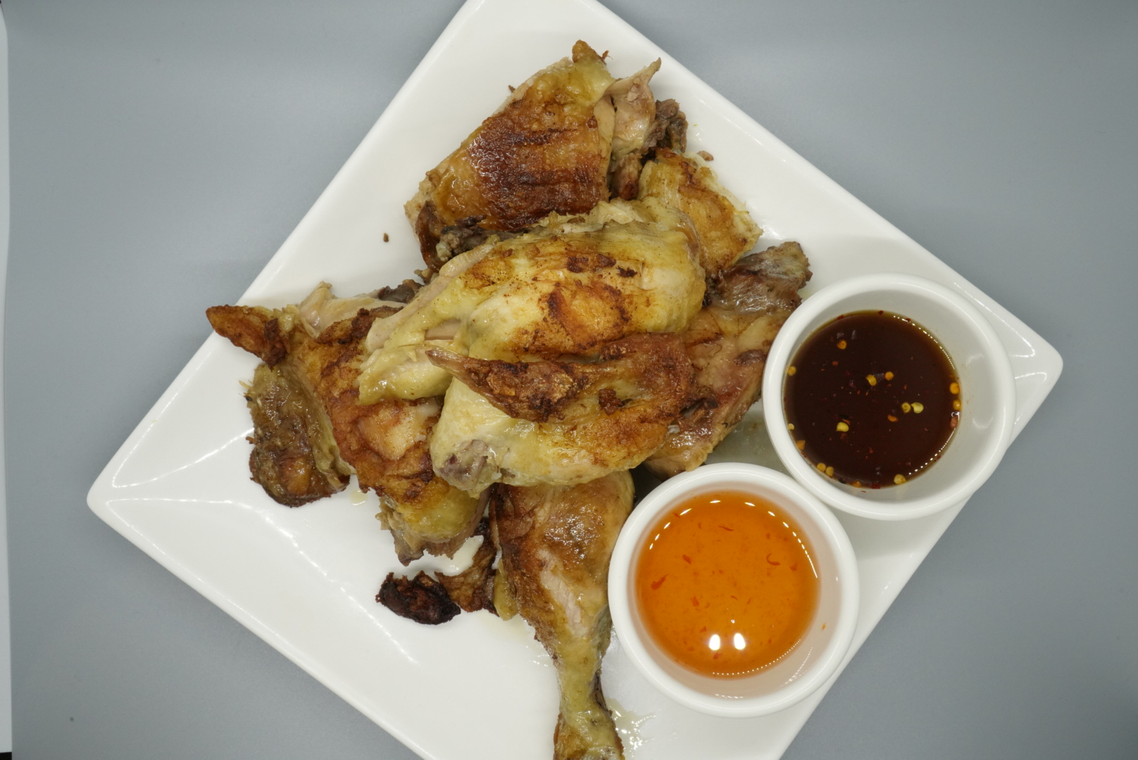Order 38. Thai BBQ Chicken food online from Royal Orchid Thai II store, Riverside on bringmethat.com