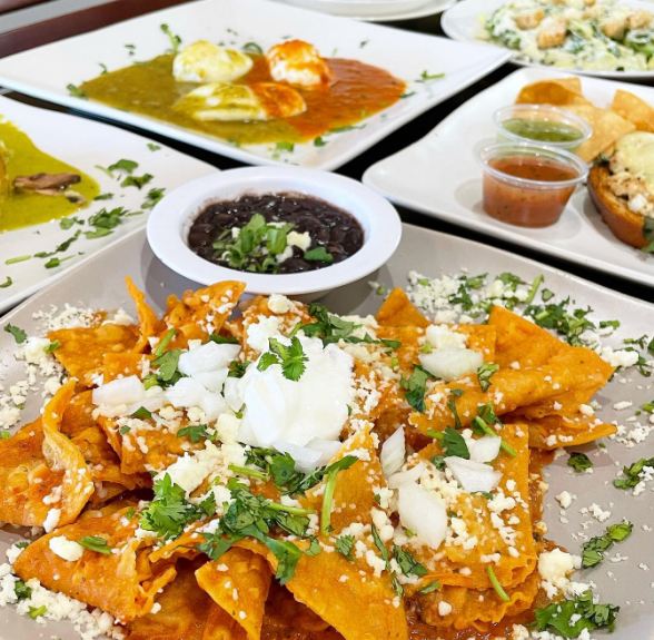 Order Chilaquiles food online from Rustika Cafe store, Houston on bringmethat.com