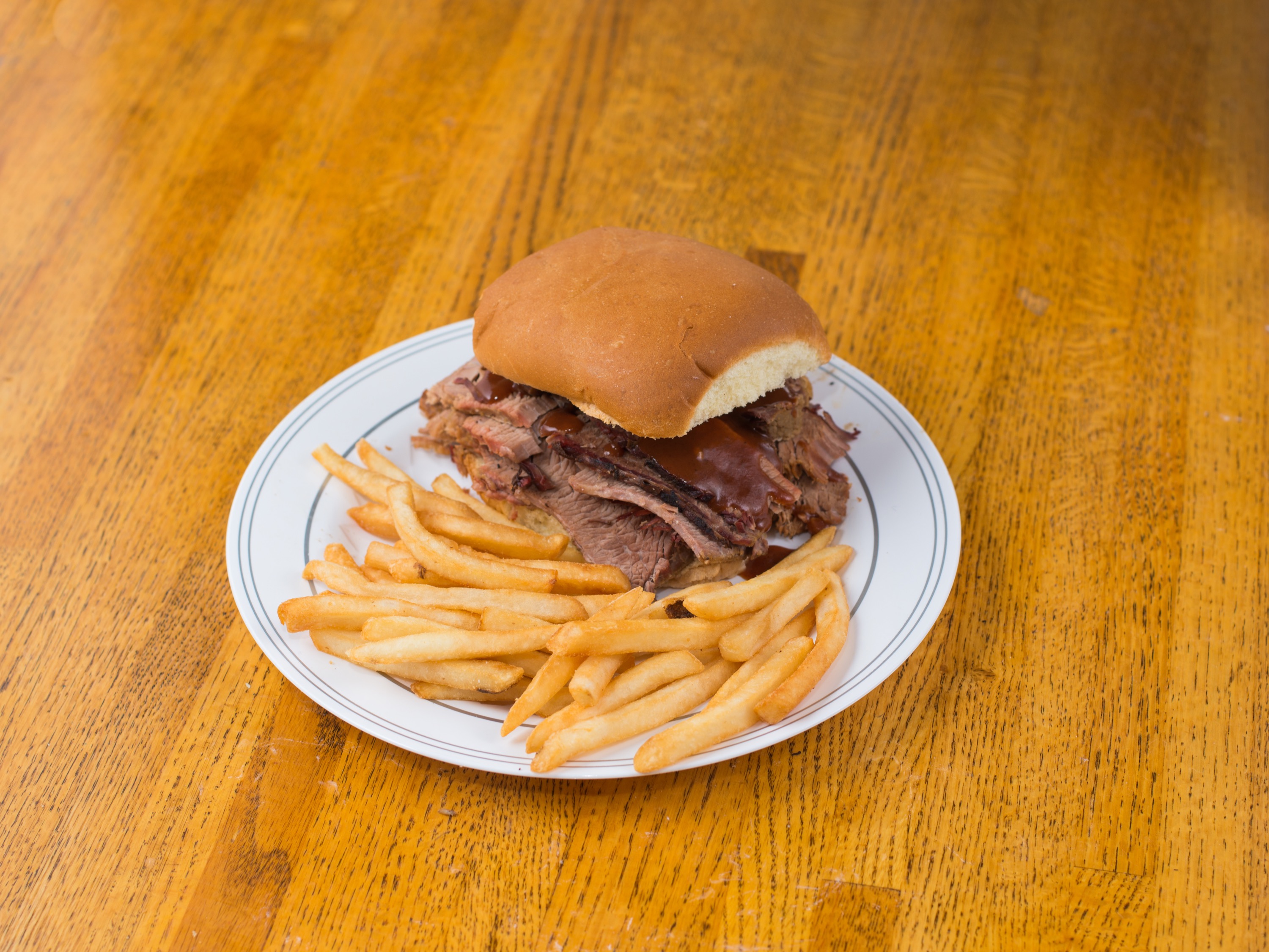 Order Smoked Brisket Sandwich Meal food online from Russell's Barbecue store, Elmwood Park on bringmethat.com