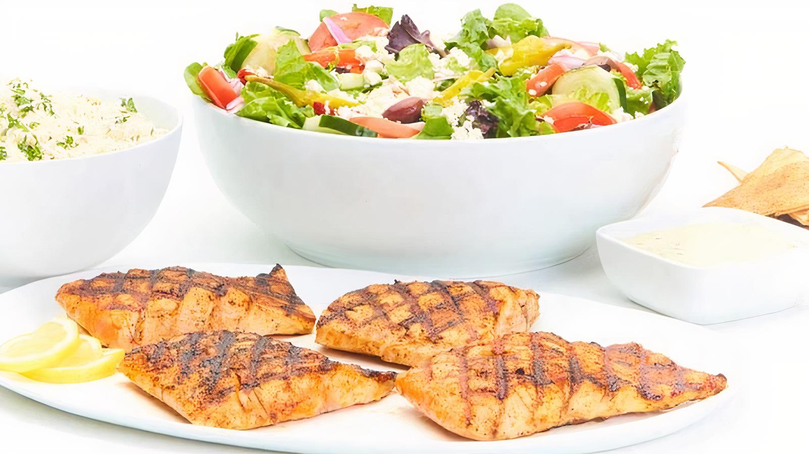Order Grilled Salmon Family Feast for 6 food online from Taziki Cafe store, Tuscaloosa on bringmethat.com