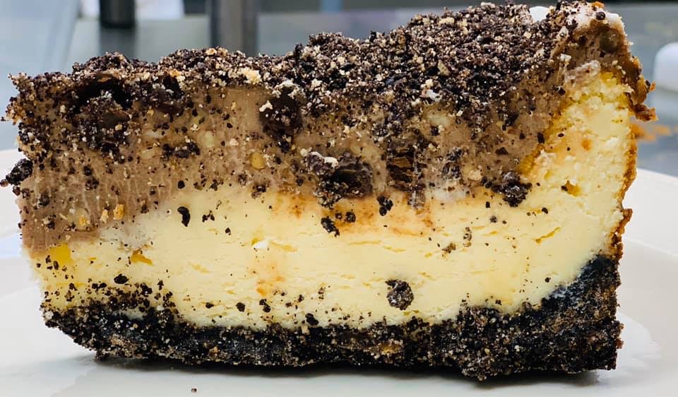 Order Homemade Turtle Cheesecake food online from Mojo Pub -N- Grill store, Youngstown on bringmethat.com