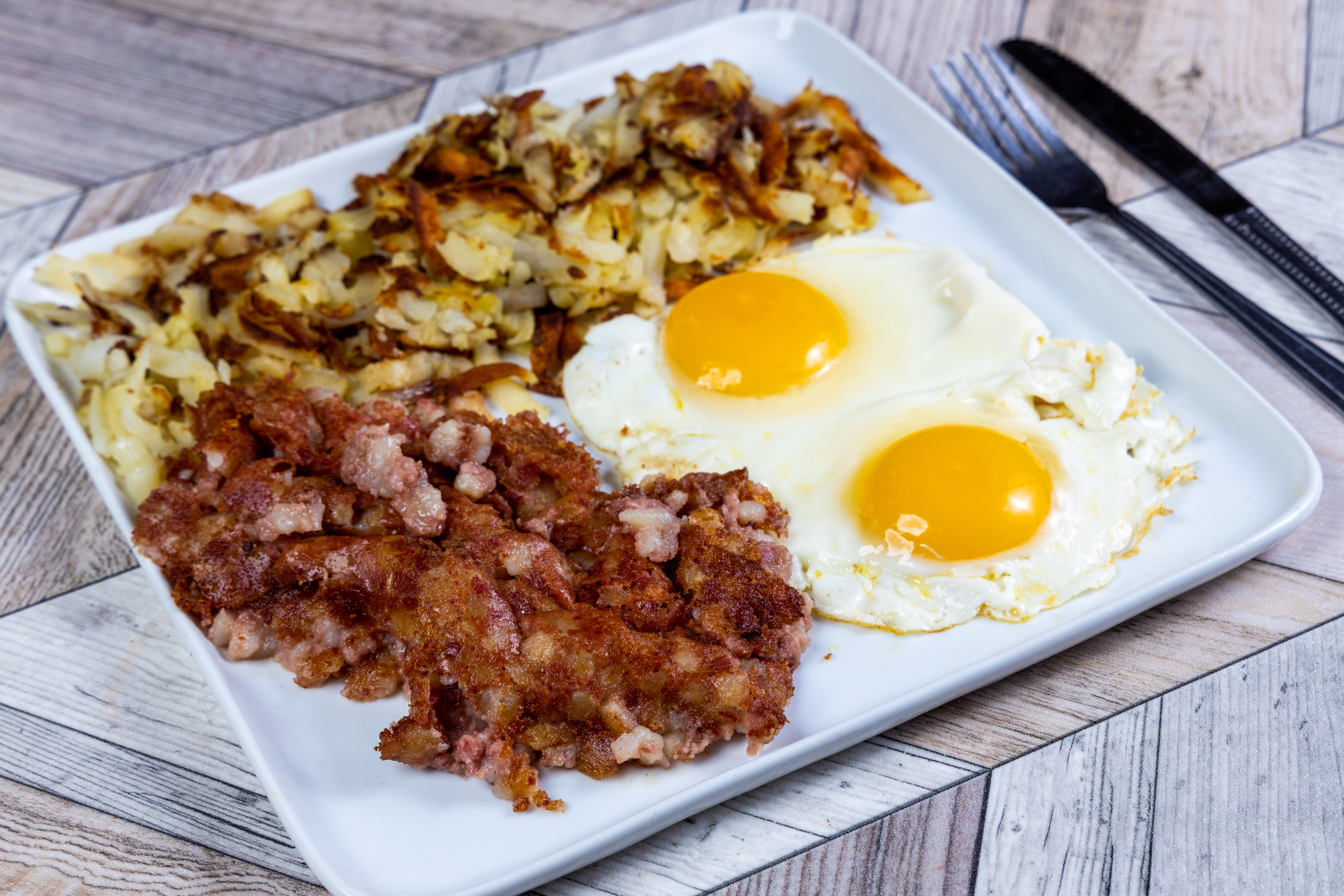 Order Extra Large Eggs Any Style with Corned Beef Hash food online from Top View Restaurant store, Chicago on bringmethat.com