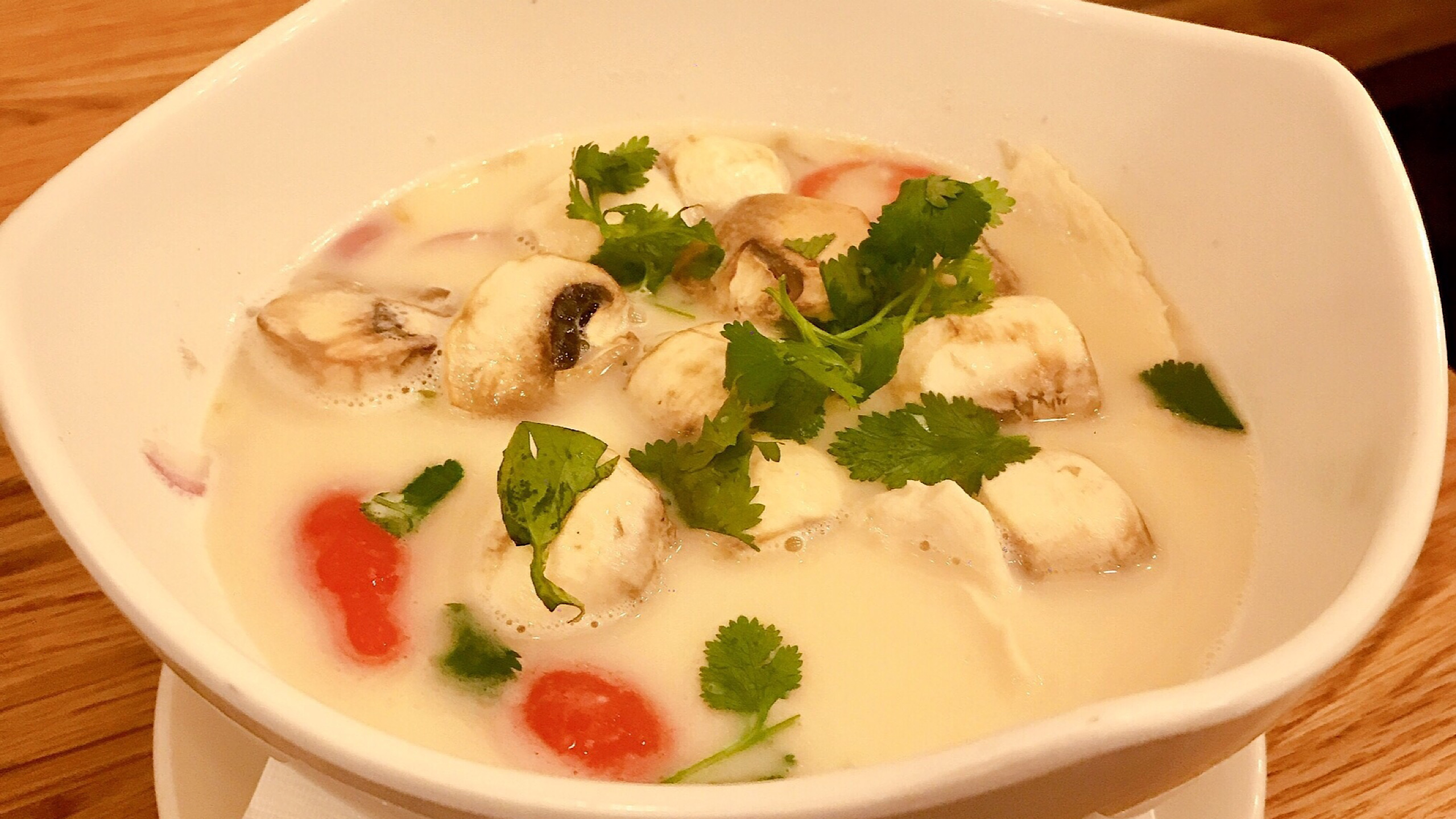 Order Tom Kha Soup (Coconut Soup) food online from Ayada Thai Restaurant Chelsea Market store, New York on bringmethat.com