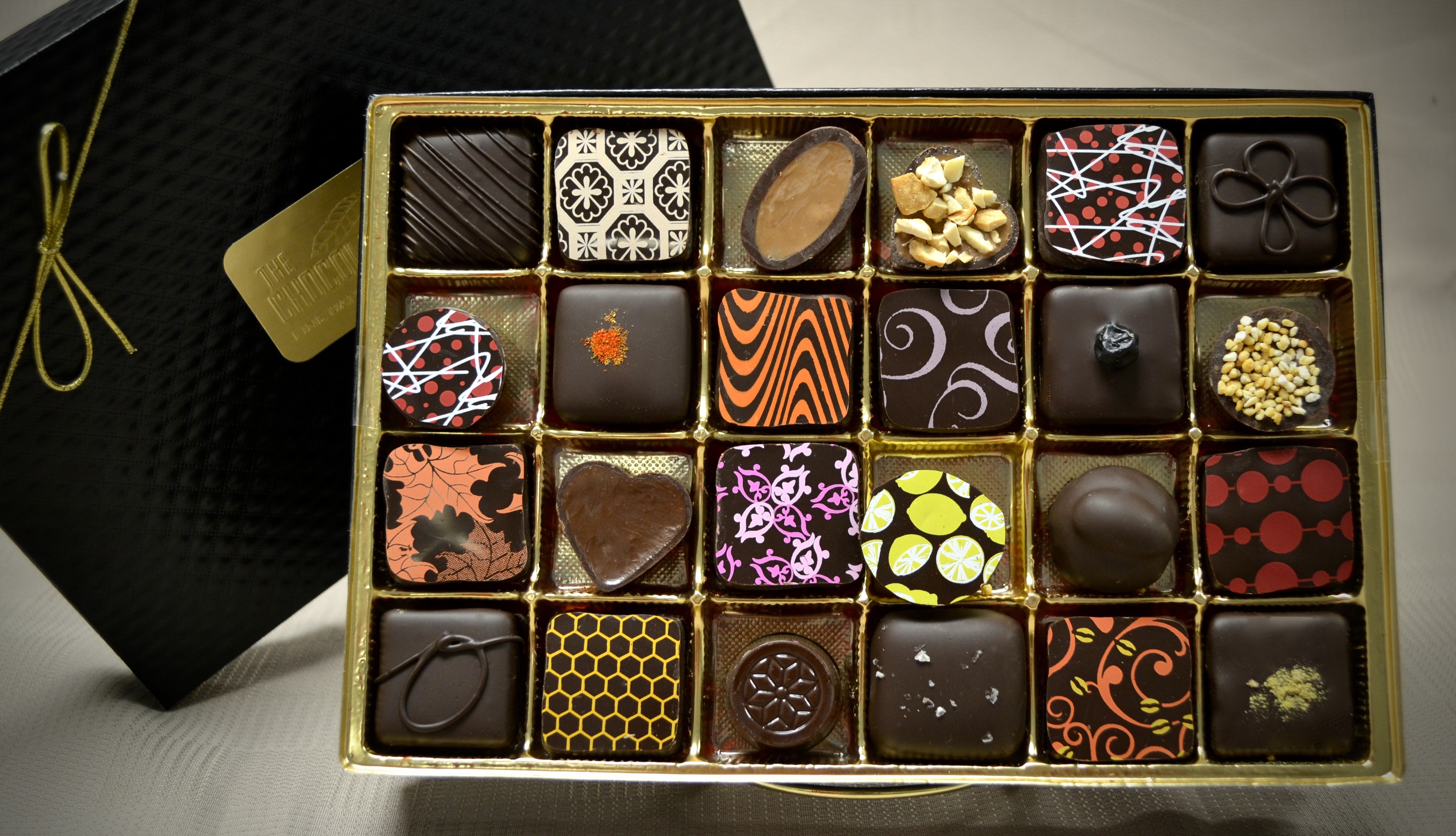 Order 24 Piece Assorted Box food online from Chocolate Cartel store, Albuquerque on bringmethat.com