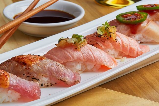 Order Handcrafted Nigiri food online from Yellowtail Sushi & Asian Kitchen store, Chicago on bringmethat.com