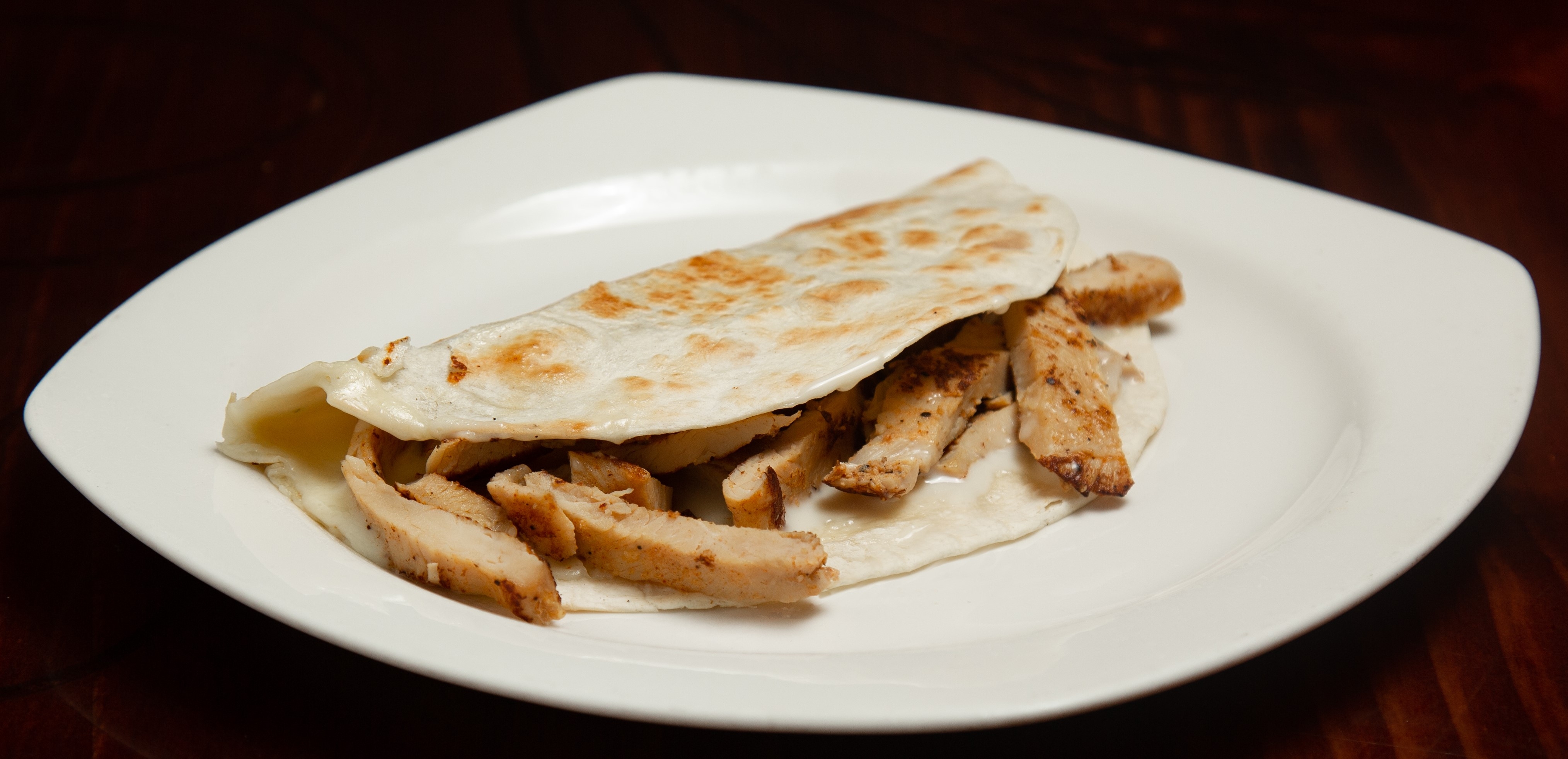 Order Grilled Chicken Quesadilla food online from Tito Mexican Restaurant store, Spring Hill on bringmethat.com