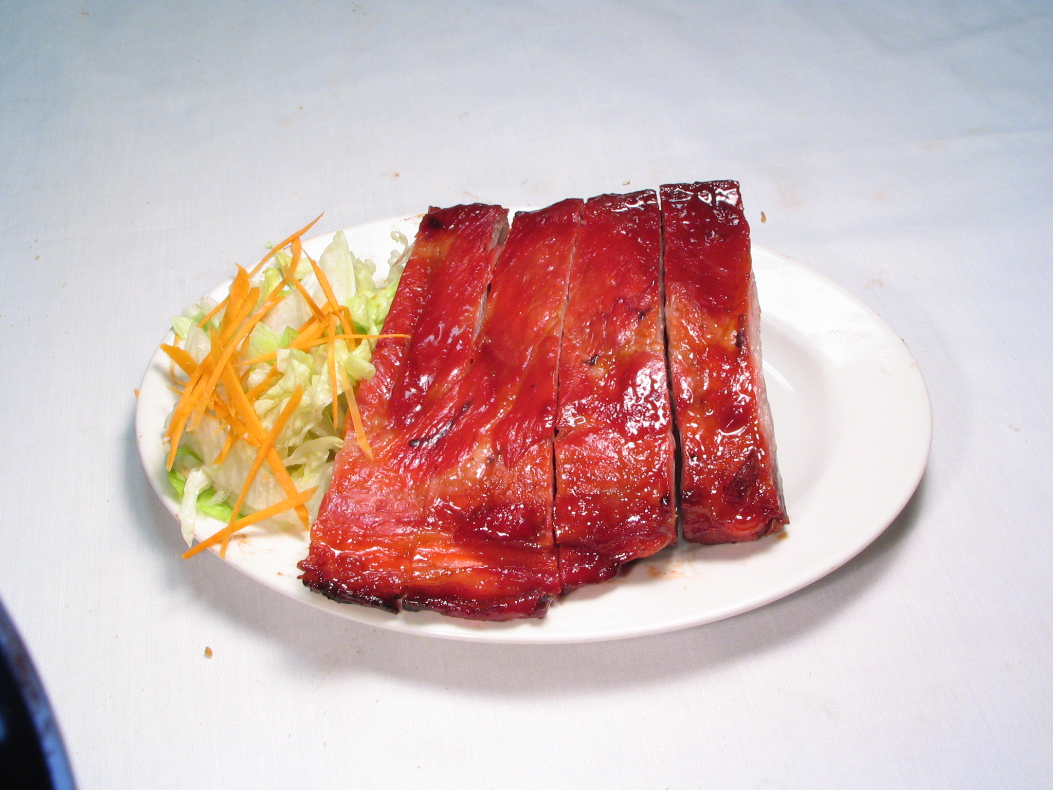 Order 4 Piece BBQ Spare Ribs food online from Kim's Restaurant store, Los Angeles on bringmethat.com