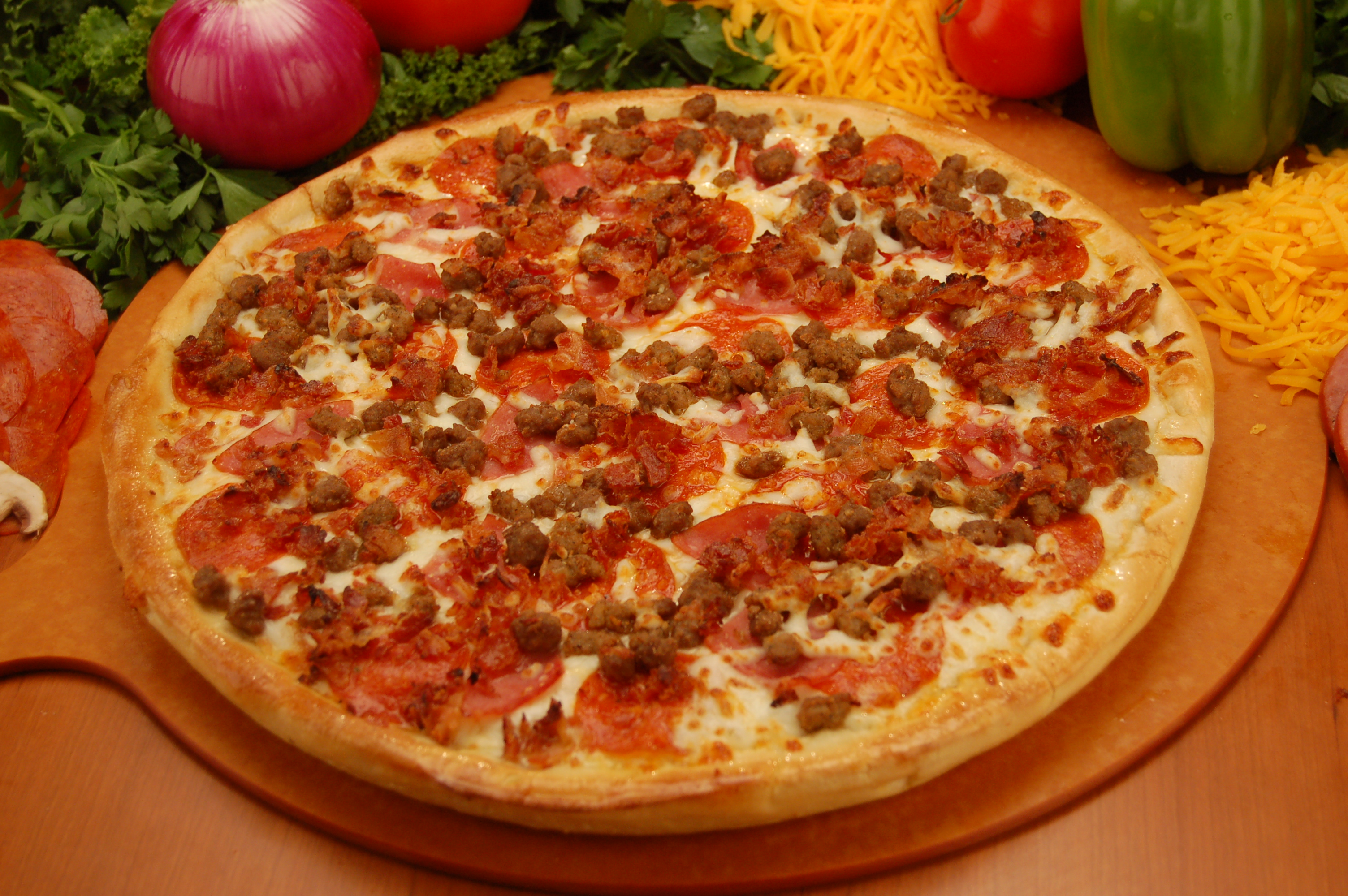Order MeatZa Pizza food online from Cheezie Pizza store, Wichita on bringmethat.com