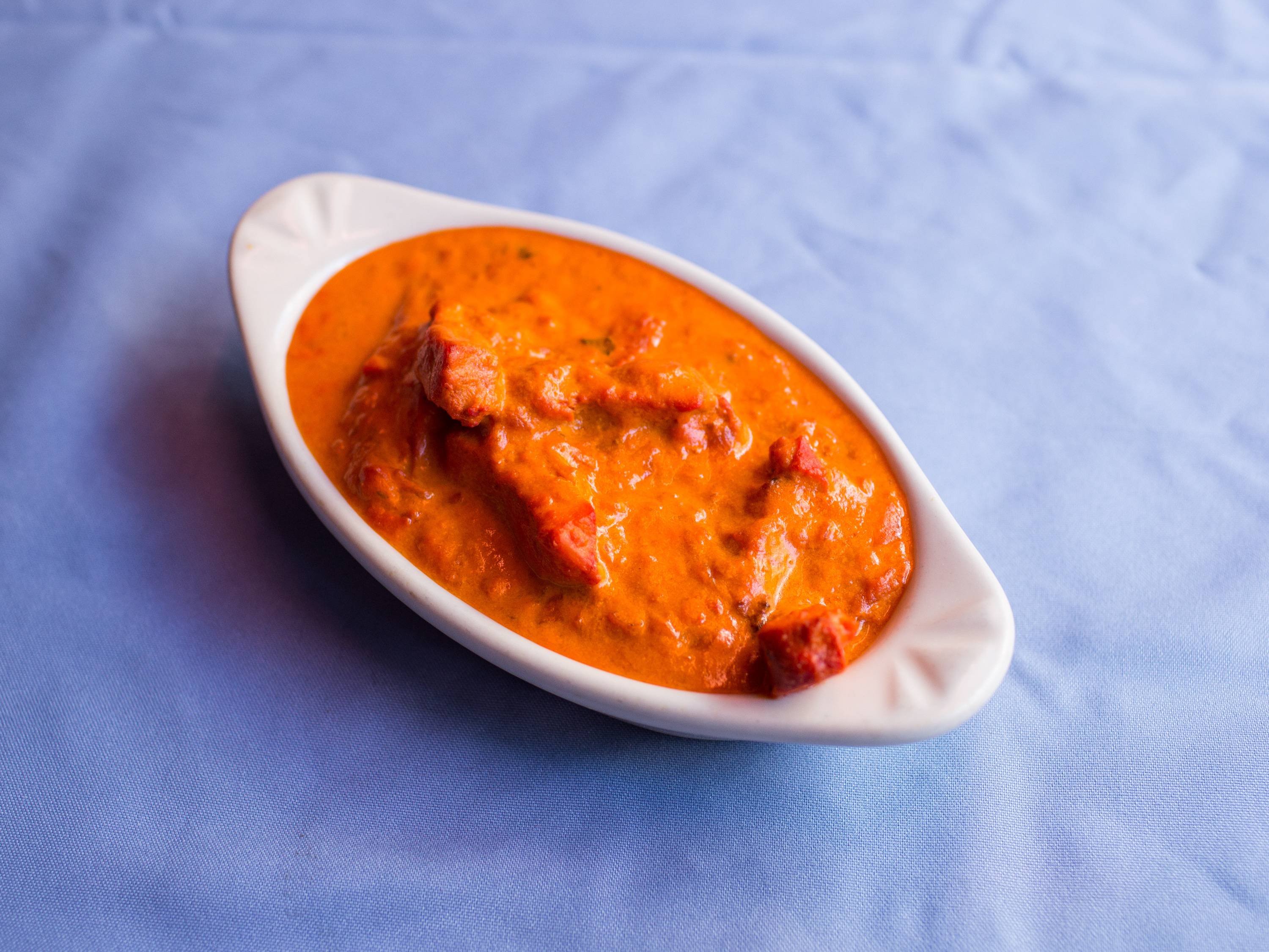 Order Butter Chicken food online from Bombay Masala Indian Restaurant store, New York on bringmethat.com