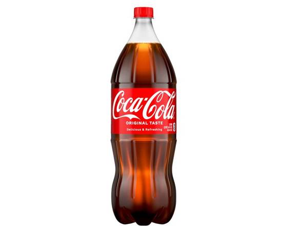 Order Coca Cola, 2L mixer food online from Divine Wine and Spirits store, San Diego on bringmethat.com