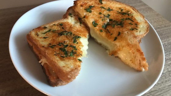 Order Garlic Grilled Cheese food online from Roadhouse Saloon store, Idaho Falls on bringmethat.com