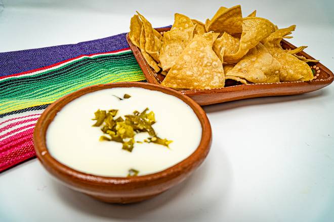 Order Cheese Dip with Jalapeños (Queso Dip Jalapeños) food online from Taco Veloz store, Doraville on bringmethat.com