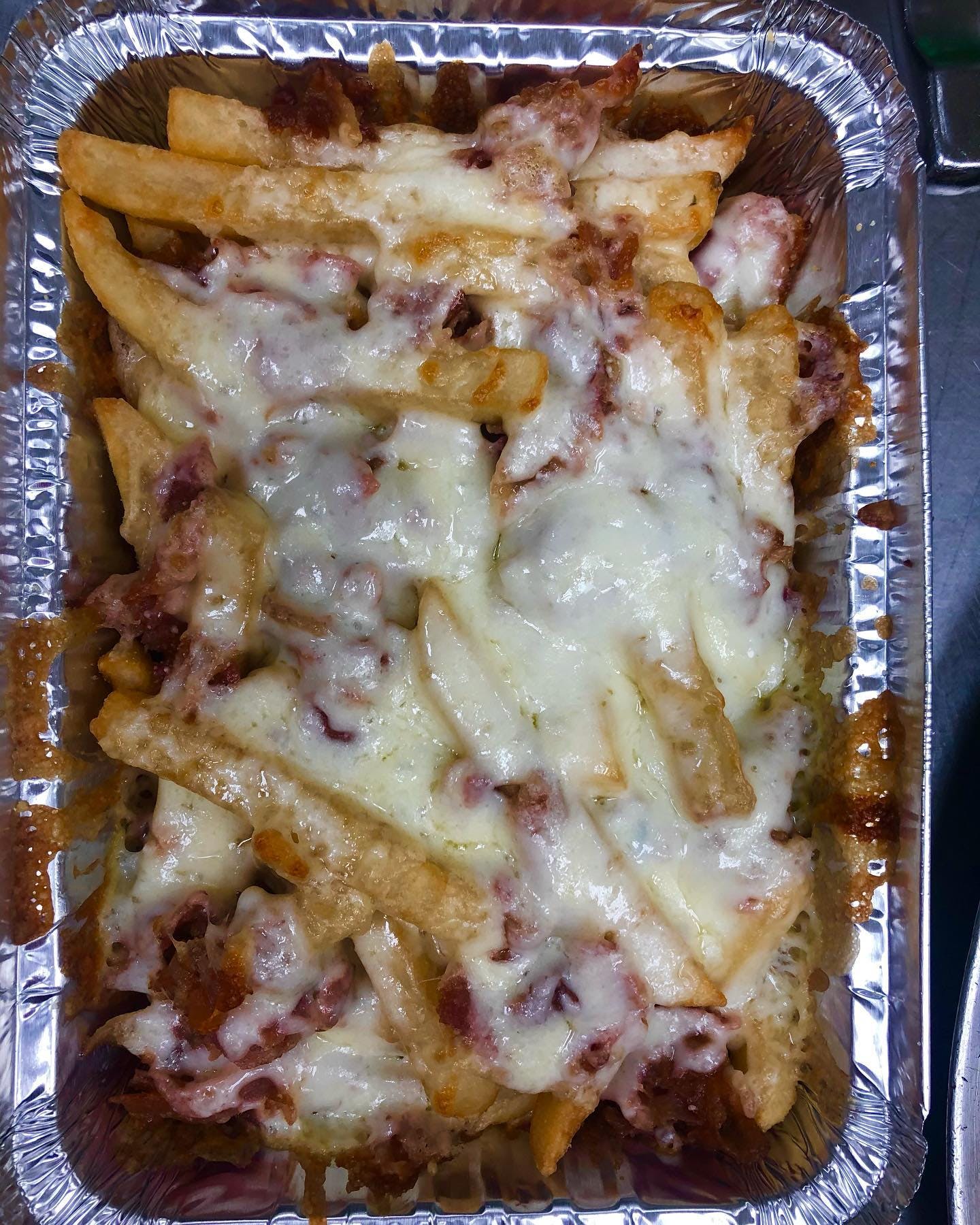 Order Cheese Fries with Bacon - Side food online from Johnny's Pizza store, Brooklyn on bringmethat.com