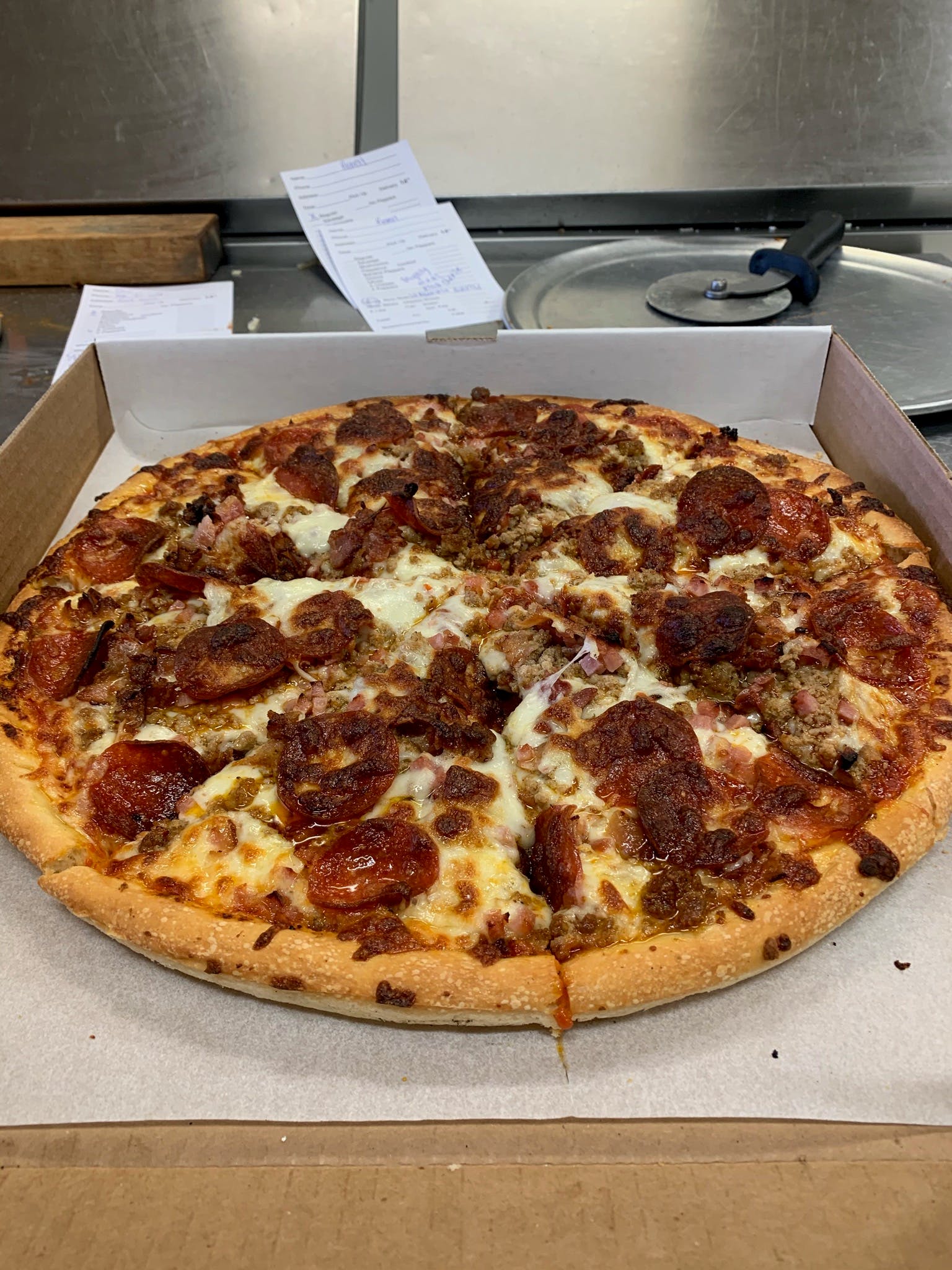 Order Mighty Meat Pizza - Medium 12'' (8 Slices) food online from Cornersburg Pizza store, Boardman on bringmethat.com
