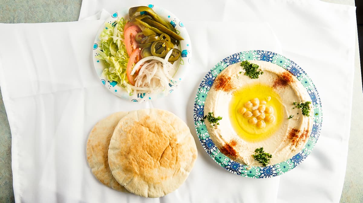 Order Hummus food online from Pita Land store, Hickory Hills on bringmethat.com