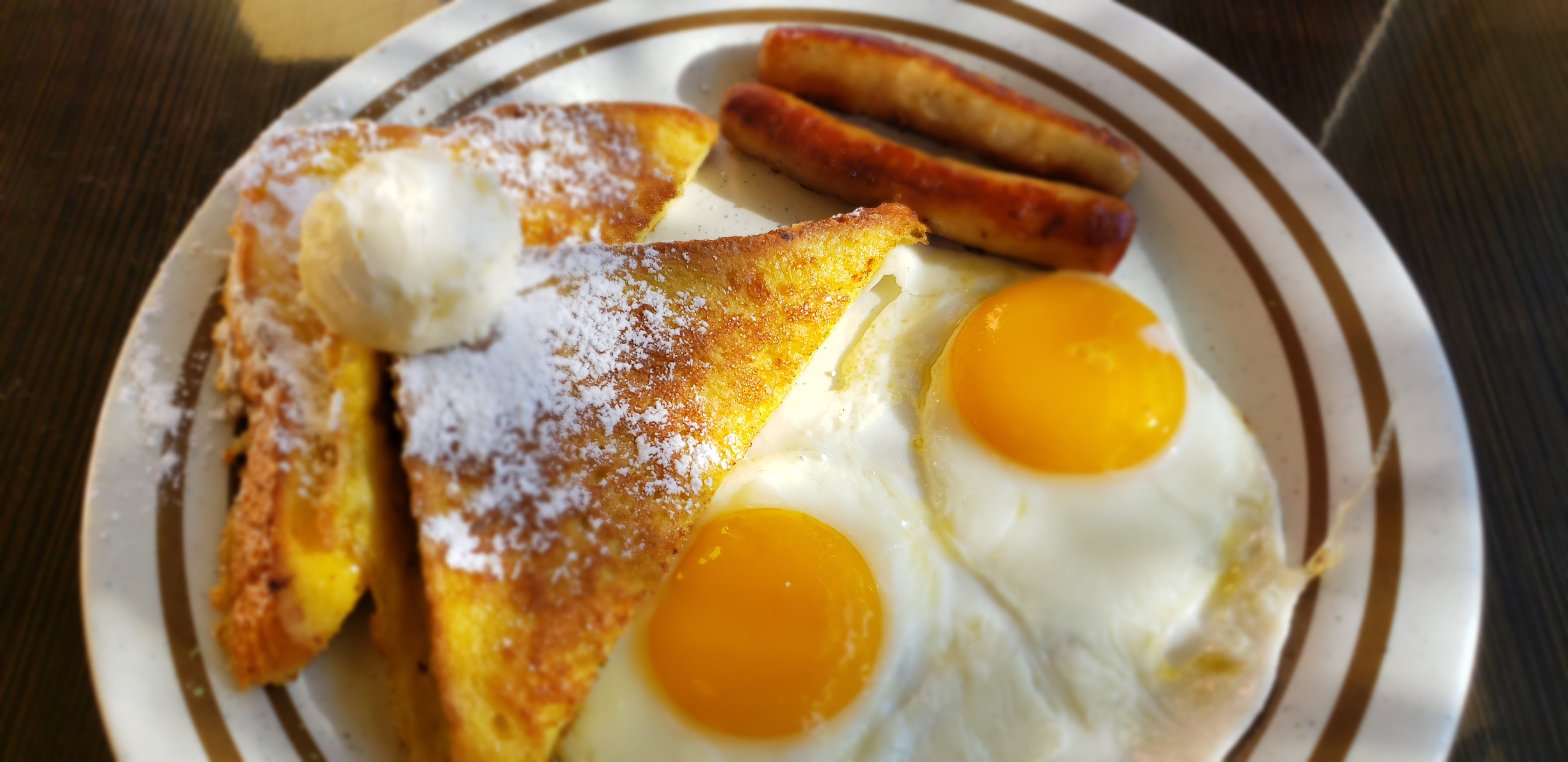 Order 2 Eggs, 2 French Toast and 2 Sausages food online from Breakfast Cafe store, Oak Park on bringmethat.com