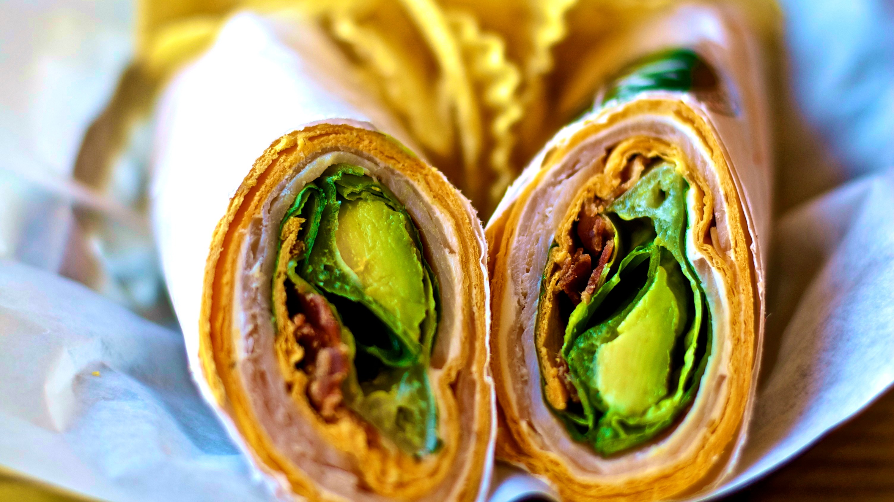 Order Turkey Avocado Bacon Wrap food online from All About Cha store, Edmond on bringmethat.com